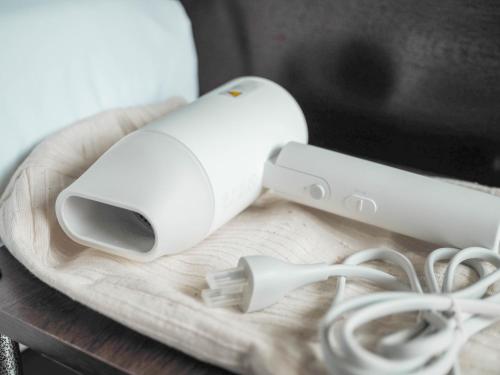 a nintendo wii game controller sitting on a table at Khampare Chiang Mai Hotel in Chiang Mai