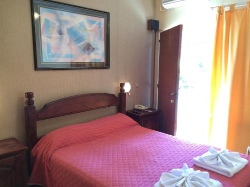 Hotel Cordoba房間的床