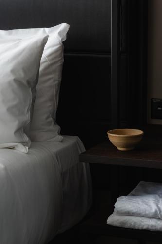 Cama o camas de una habitación en Ebb-Dunedin