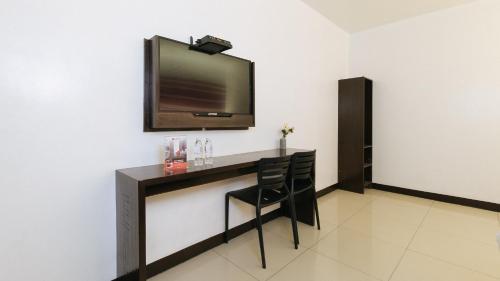 Μια τηλεόραση ή/και κέντρο ψυχαγωγίας στο RedDoorz @ EL Highway Hotel Bulacan