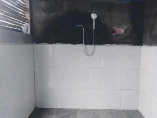 Um banheiro em Alengkong Double View