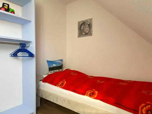 Una cama o camas en una habitación de Ferienhaus Marina