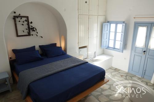 Voodi või voodid majutusasutuse Seaside Traditional Cycladic House toas