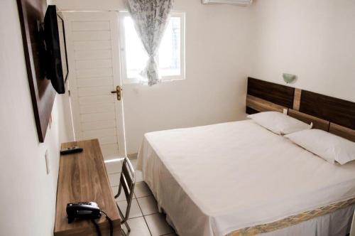 Katil atau katil-katil dalam bilik di Hotel Ouro Negro