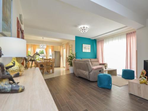 a living room with a couch and a table at Holiday Home Valdor by Interhome in Sovlje