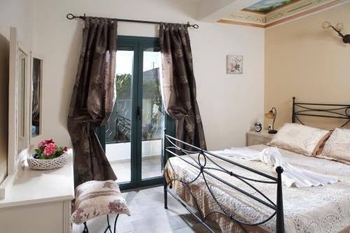 Postel nebo postele na pokoji v ubytování Pandora Villas