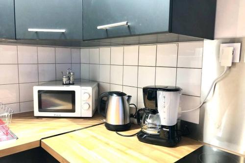 Η κουζίνα ή μικρή κουζίνα στο Appart proche gare + Parking , Impasse tranquille