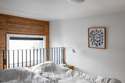 a bedroom with a bed and a window at Upperud 9:9 in Åsensbruk