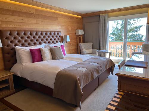 Postel nebo postele na pokoji v ubytování Hotel Royal