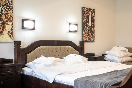 Ένα ή περισσότερα κρεβάτια σε δωμάτιο στο Bran Chalet