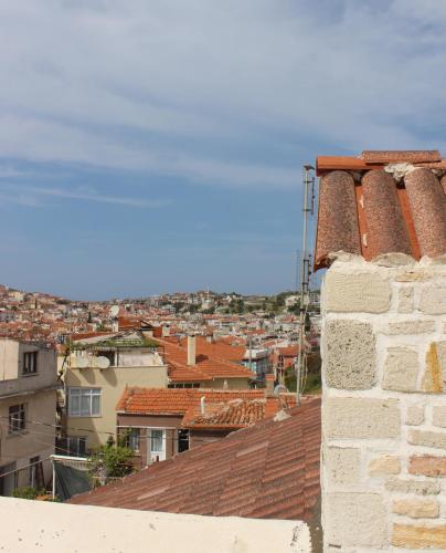 a view of a city from the roof of a building at Eski Tas Hotel in Cesme