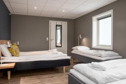 Cama o camas de una habitación en Fast Hotel Svolvær