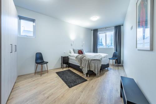 Postel nebo postele na pokoji v ubytování Nortia Apartments