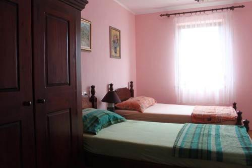 Ліжко або ліжка в номері Summer house in Novalja