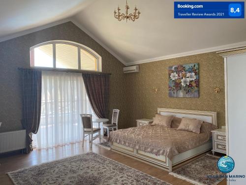 Postel nebo postele na pokoji v ubytování Villa San Marino