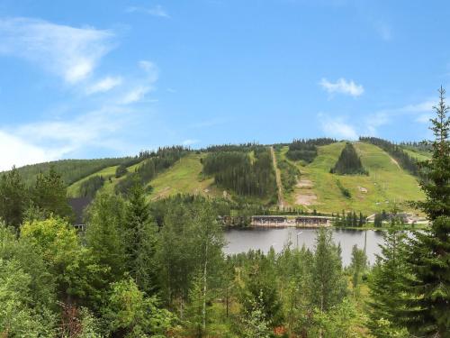 a view of a mountain with a lake and trees at Holiday Home Iso kiiruna by Interhome in Hyrynsalmi