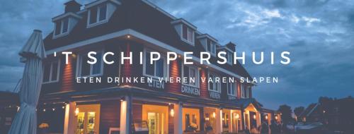 a building with the words t on it at Schippershuis Terherne in Terherne