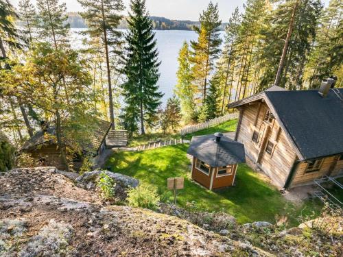 an aerial view of a small cabin in the woods at Holiday Home Miilu by Interhome in Iitti