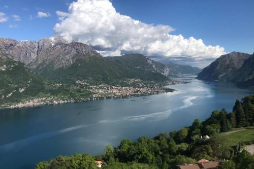 a view of a lake in the mountains at TRADITIONAL VILLA BELLAGIO san primo LAKE COMO in Bellagio