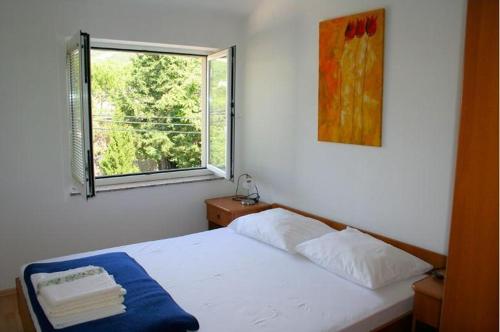 Postel nebo postele na pokoji v ubytování Villa Planjka (133)