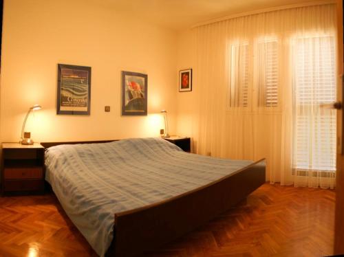 Postel nebo postele na pokoji v ubytování Apartment Hvar (221-2)