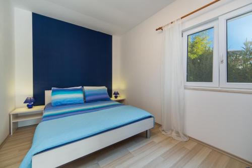 Llit o llits en una habitació de Guesthouse Brist (610)