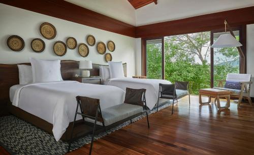 Postel nebo postele na pokoji v ubytování Four Seasons Resort Peninsula Papagayo, Costa Rica