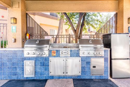 a set of appliances on a blue tiled counter at Sahuaro Condos in Scottsdale