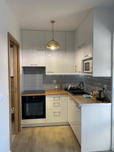 Η κουζίνα ή μικρή κουζίνα στο Apartament Na Wzgórzu