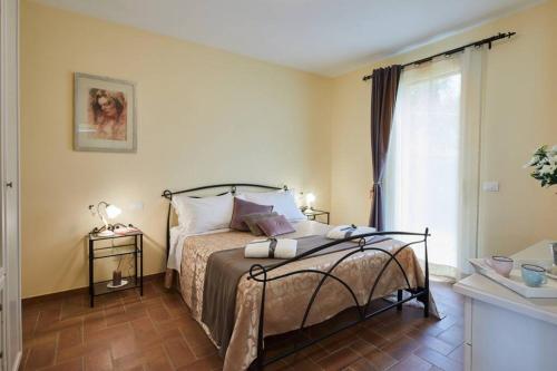Ένα ή περισσότερα κρεβάτια σε δωμάτιο στο Casa da Adriano in Dimora Frediani