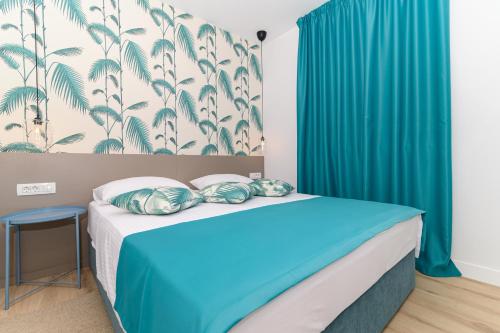 Posteľ alebo postele v izbe v ubytovaní Hygge Boutique Apartment