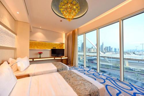 Tempat tidur dalam kamar di Cielo Hotel Lusail Qatar