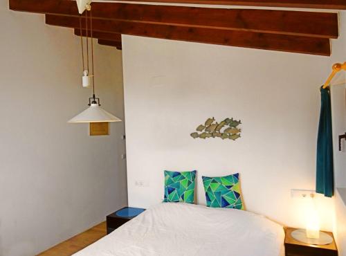 Voodi või voodid majutusasutuse Casa Caracol toas