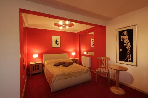 Tempat tidur dalam kamar di Hotel Millennium