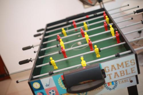 a snooker table with ping pong balls on it at Colombo Orchid Villa in Colombo