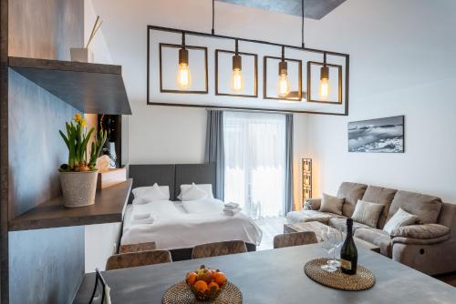 Postel nebo postele na pokoji v ubytování Apartmány Resort Vrchlabí