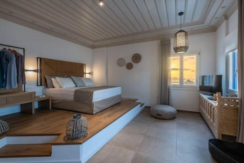 Voodi või voodid majutusasutuse Luxury Apartment in the Heart of Astypalaia toas