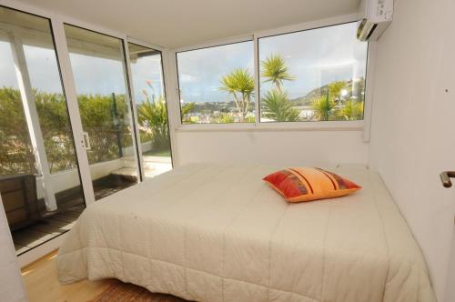 En eller flere senge i et værelse på Albufeira Villa Okapi