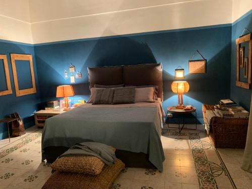 Postel nebo postele na pokoji v ubytování Villa “La quagliara “ sea view
