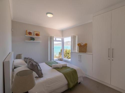 Postel nebo postele na pokoji v ubytování Lagoon Escape Beach Villa