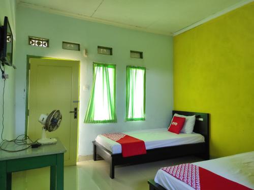Легло или легла в стая в OYO 90333 Wisma Tenang Jaya Syariah