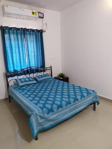 Postel nebo postele na pokoji v ubytování Jiten Homestay