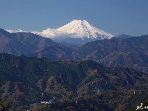 a snow capped mountain in the middle of a valley at Hotel Wing International Sagamihara in Sagamihara