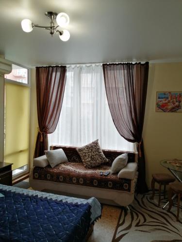  Кровать или кровати в номере Апартаменты на Крымской 81 