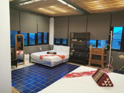 Postel nebo postele na pokoji v ubytování Beautiful Yilan Resort