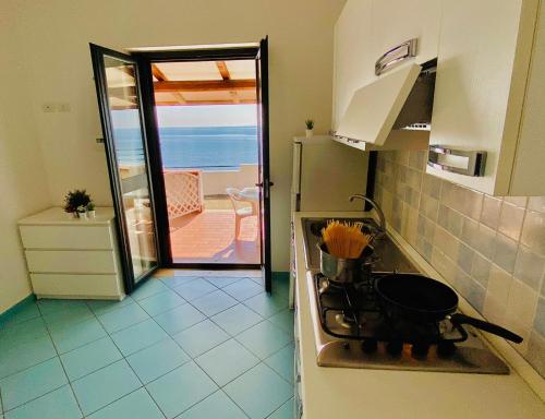 Η κουζίνα ή μικρή κουζίνα στο Villaggio Dolce Vita Residence
