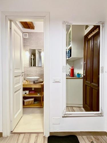 an open door to a kitchen with a sink at CERO Brasov in Braşov