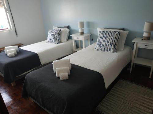Łóżko lub łóżka w pokoju w obiekcie Casa São Francisco