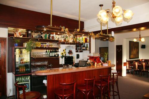 Lounge nebo bar v ubytování Penzion Loreta