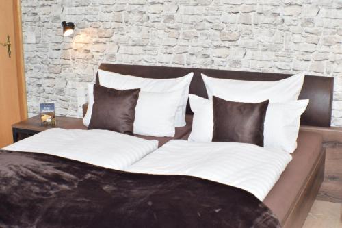 Ένα ή περισσότερα κρεβάτια σε δωμάτιο στο Bachmeier's Gasthaus Traube Niederfell